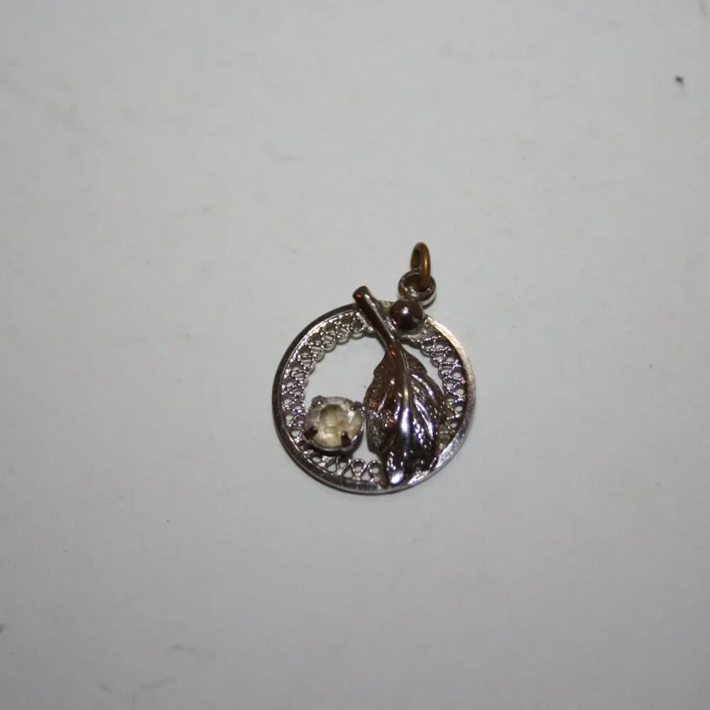 Beautiful vintage silver leaf and rhinestone pendant .75